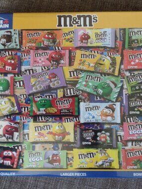 NWT unopened M & M's 1000-piece jigsaw puzzle featuring classic candy imagery